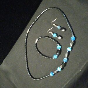 Hermatite and blue cats Eye glass